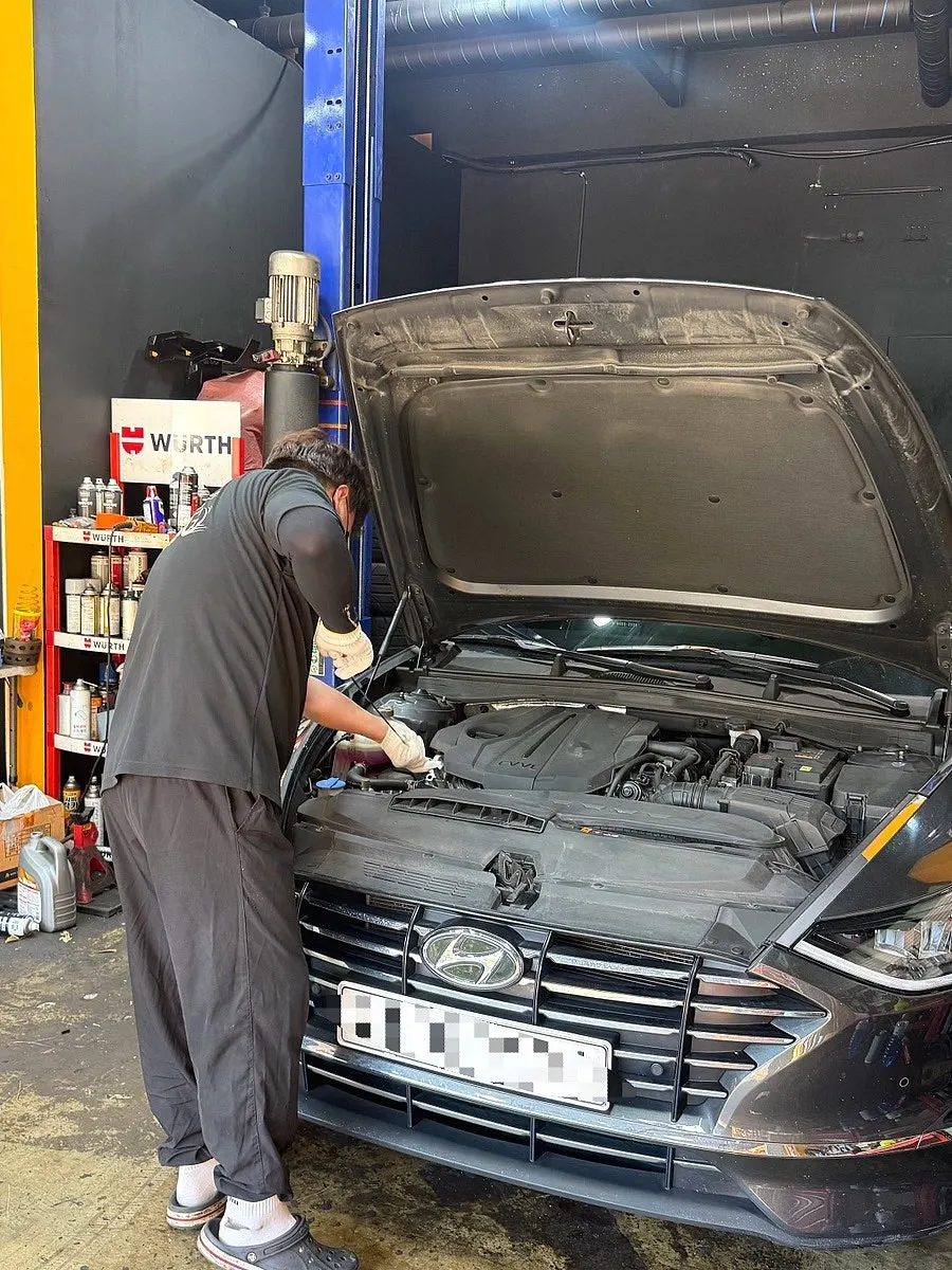 Vehicle being prepared for the engine oil change