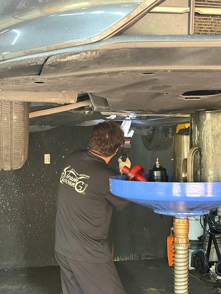 Inspecting the undercarriage with a light