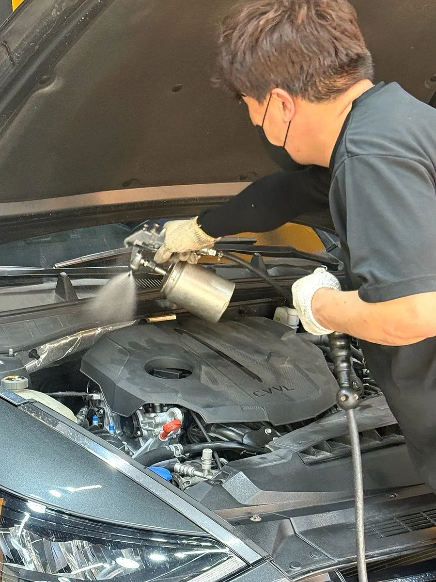 Topping up washer fluid as a free service