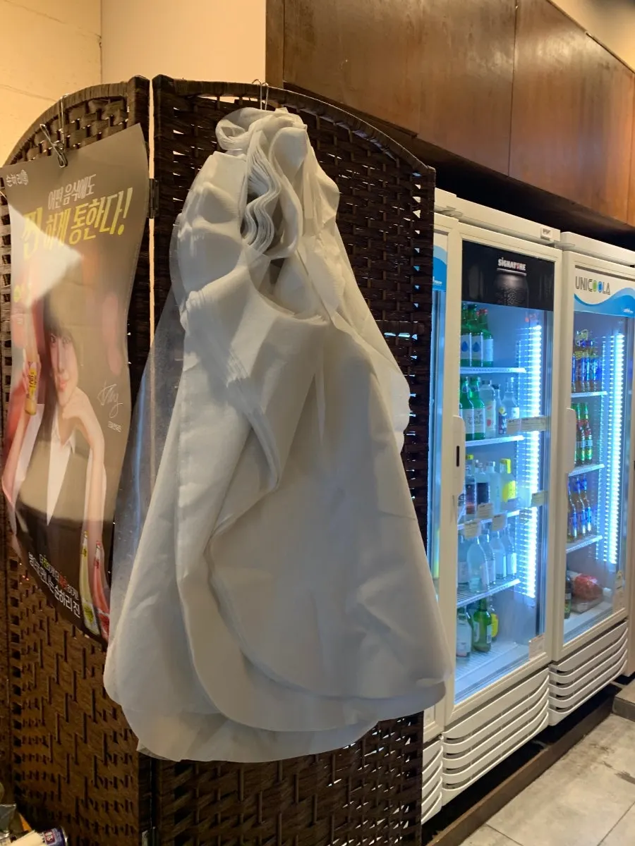 Water purifier and disposable apron station