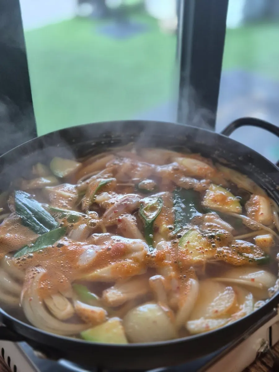 Octopus vegetable porridge with chewy octopus pieces
