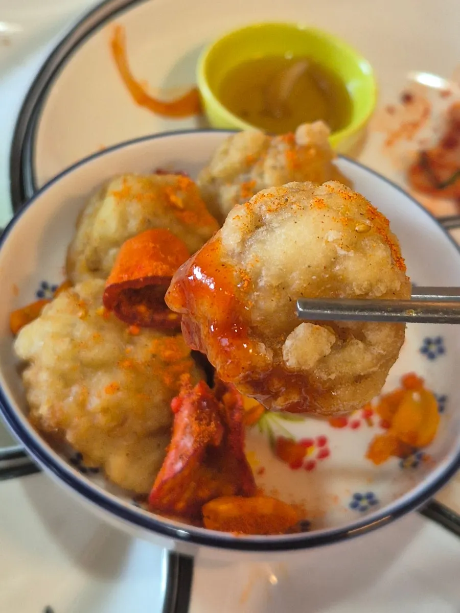 Boneless monkfish fry dipped in seasoning sauce