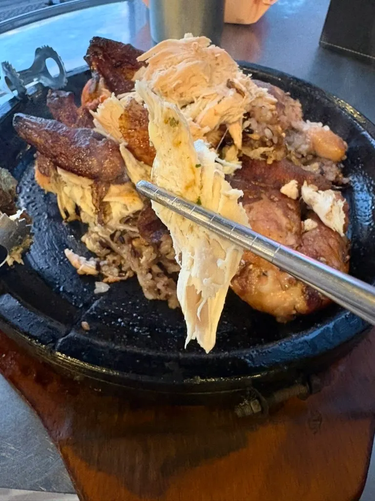 Moist chicken breast carved by a staff member