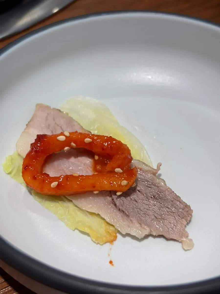 A piece of gabrisal served with bossam kimchi