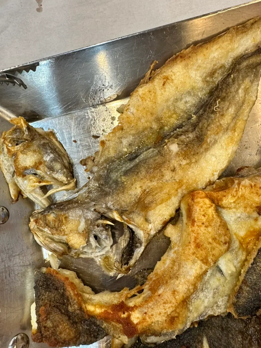 Grilled flounder with plump flesh visible