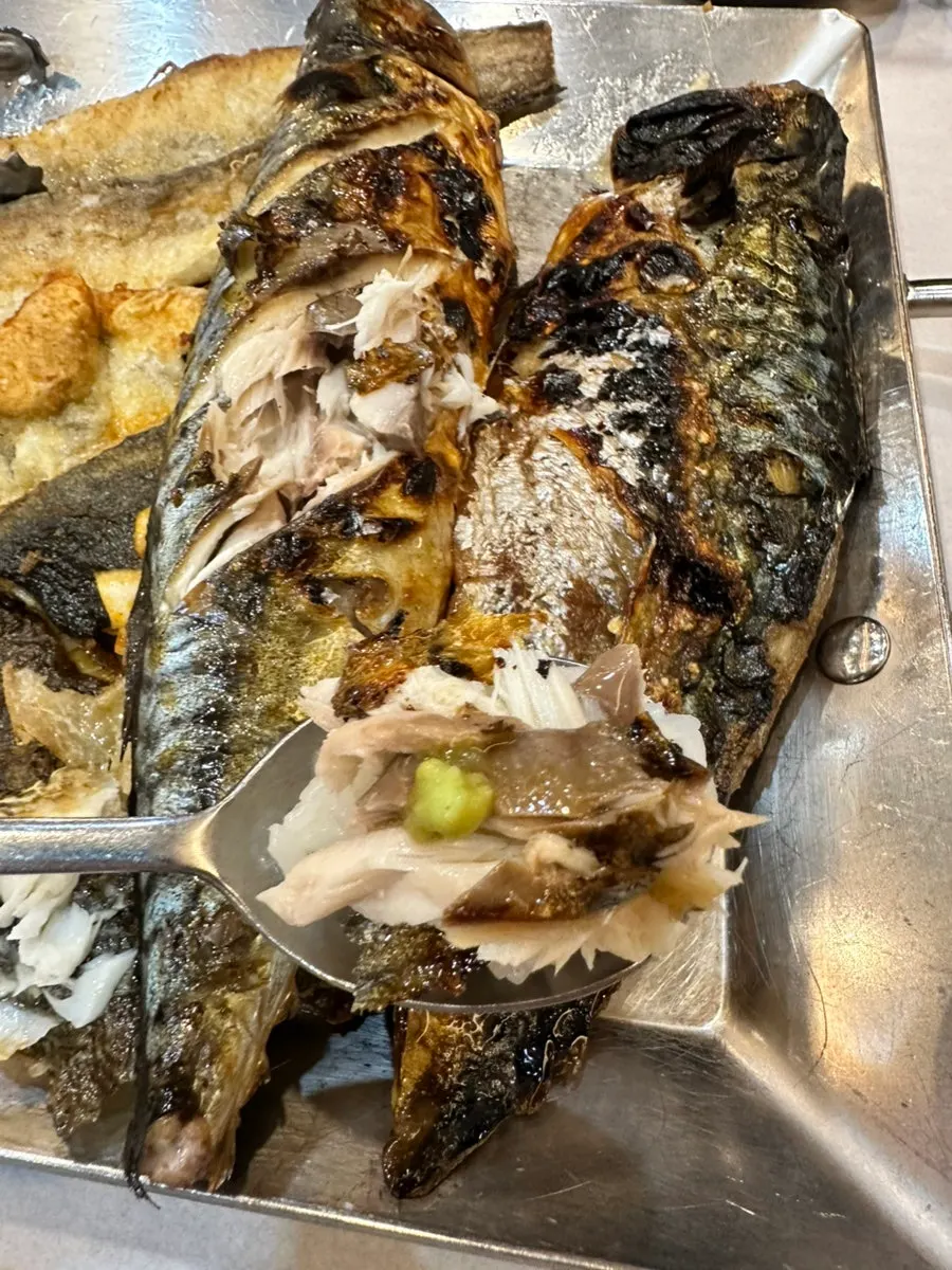 A big chunk of mackerel with a spoonful of sotbap