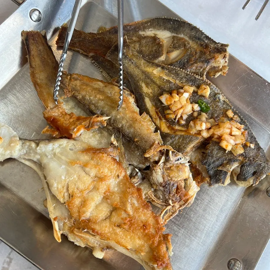 Full spread of the seasonal grilled fish set for two