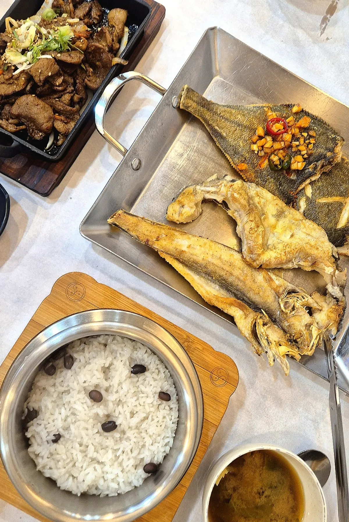 Seasonal grilled fish spread at Min Cook Apbadang in Seongsa-dong