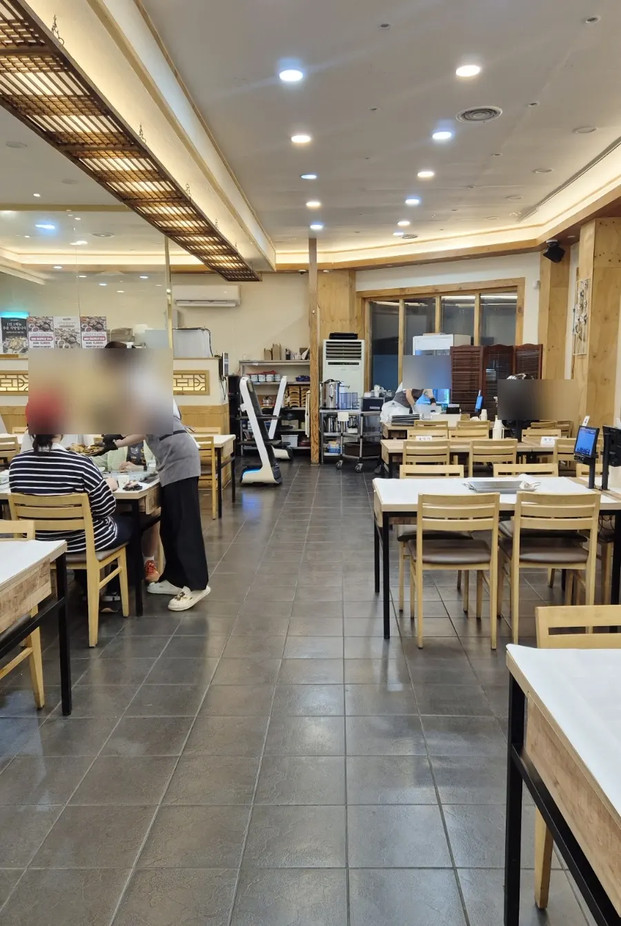 Clean interior of Min Cook Apbadang, a Korean restaurant