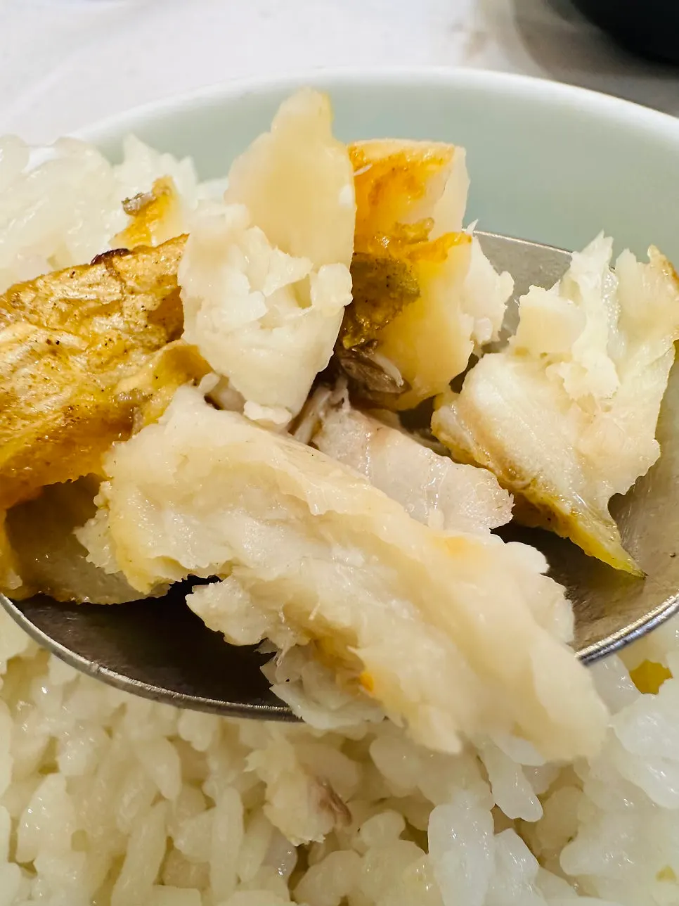 A spoonful of deboned grilled silver cutlassfish