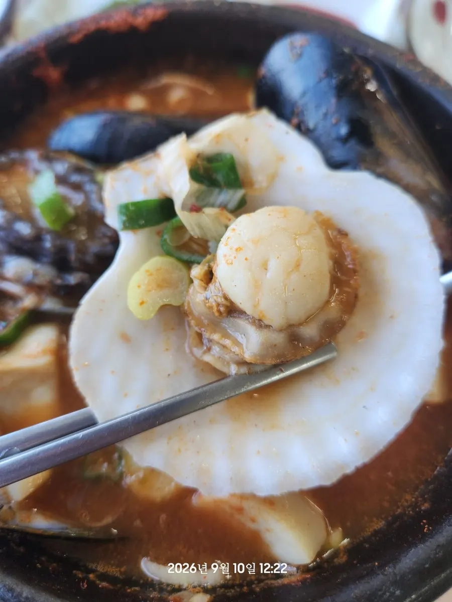 Eating abalone with the stew