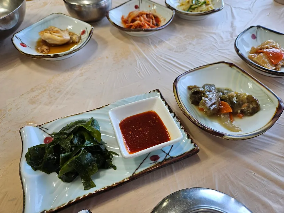Empty braise pot and dishes after the meal