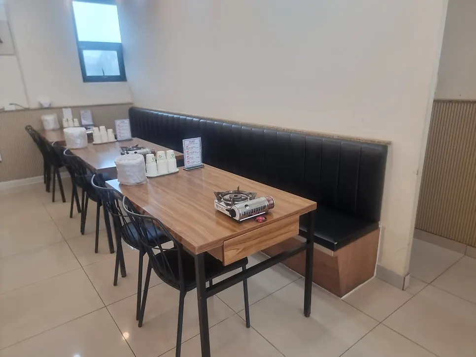 Spacious dining area at Jejurowoon Cheonghaewon