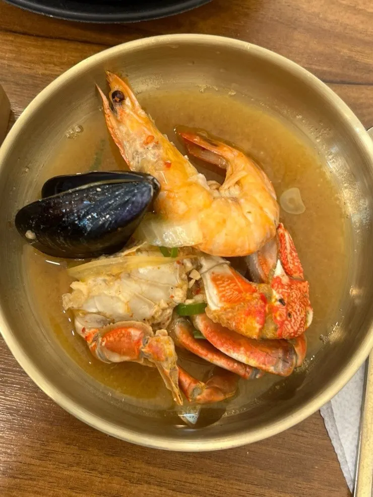 Seafood stew with crab, shrimp, and mussels