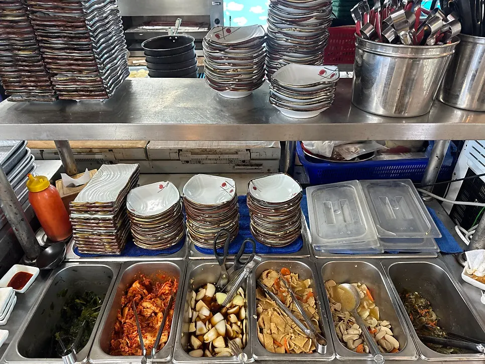 Self-serve side dish counter at Seongsan Bada Punggyeong