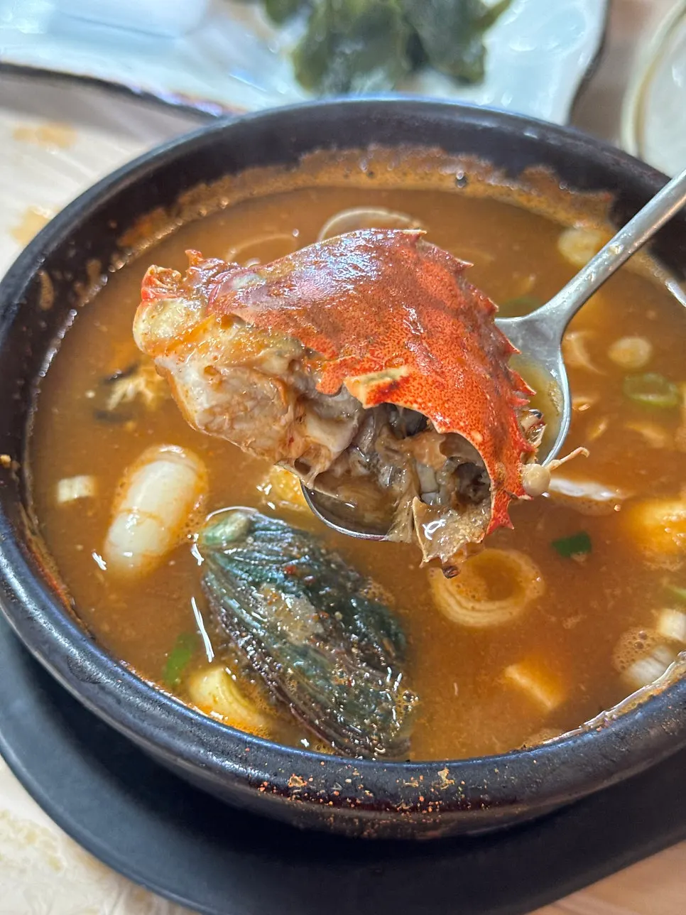 Abalone and seafood inside the stew pot