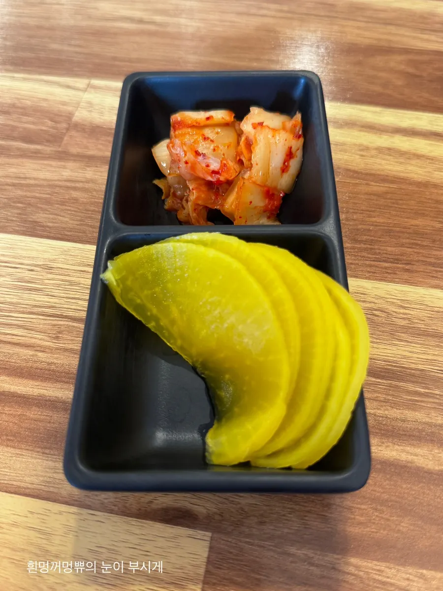 Self-serve corner for pickled radish and kimchi