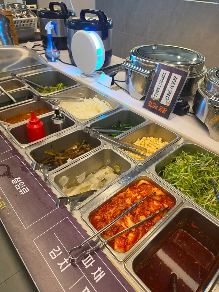 Self-service bar with assorted side dishes