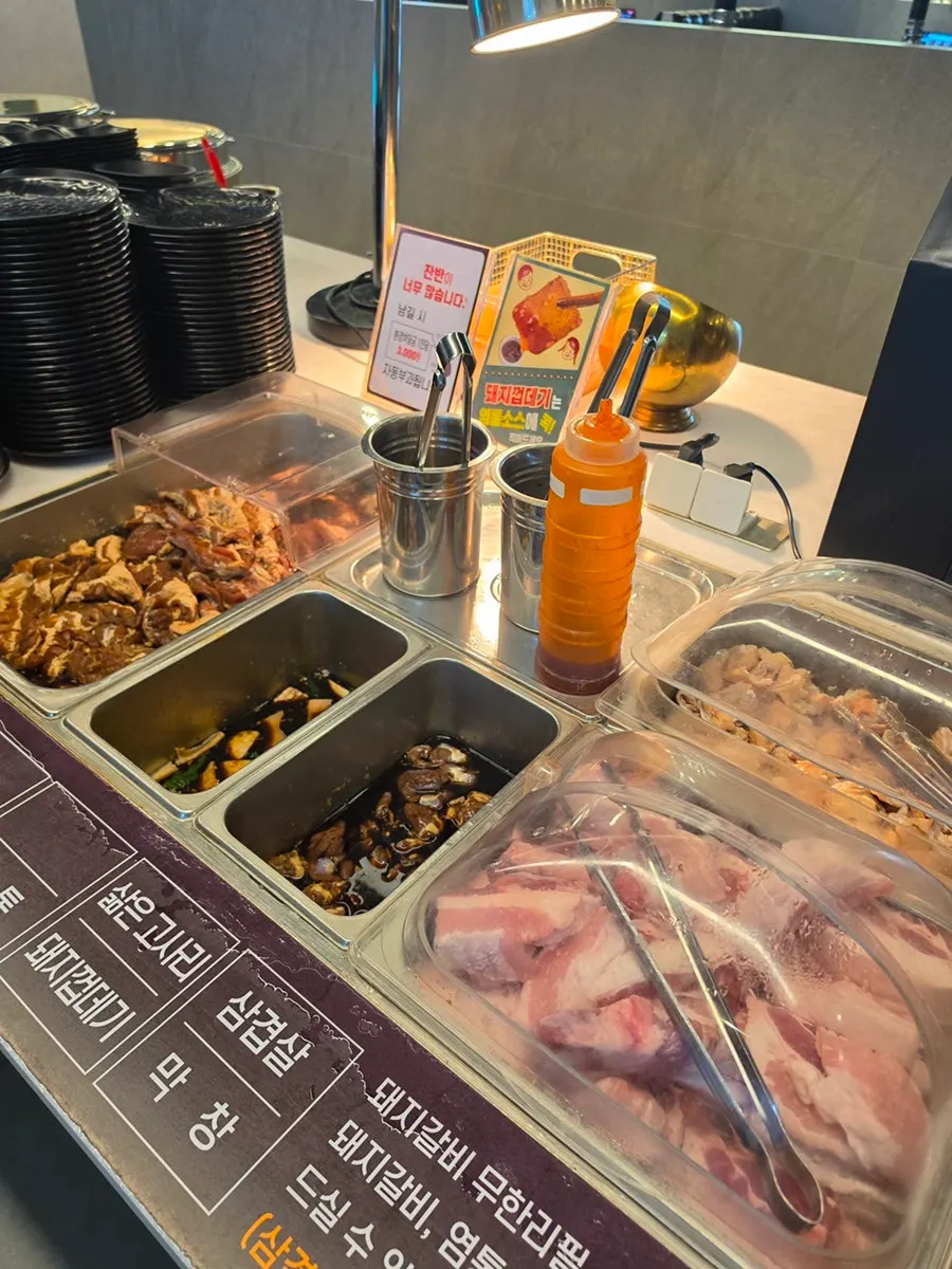 Vegetables and side dishes at the meat buffet self-service bar