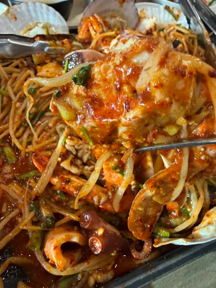 Webfoot octopus and bean sprouts picked up together