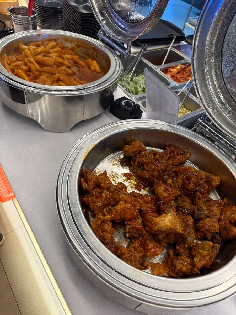Self-service grill plate replacement area beside the table