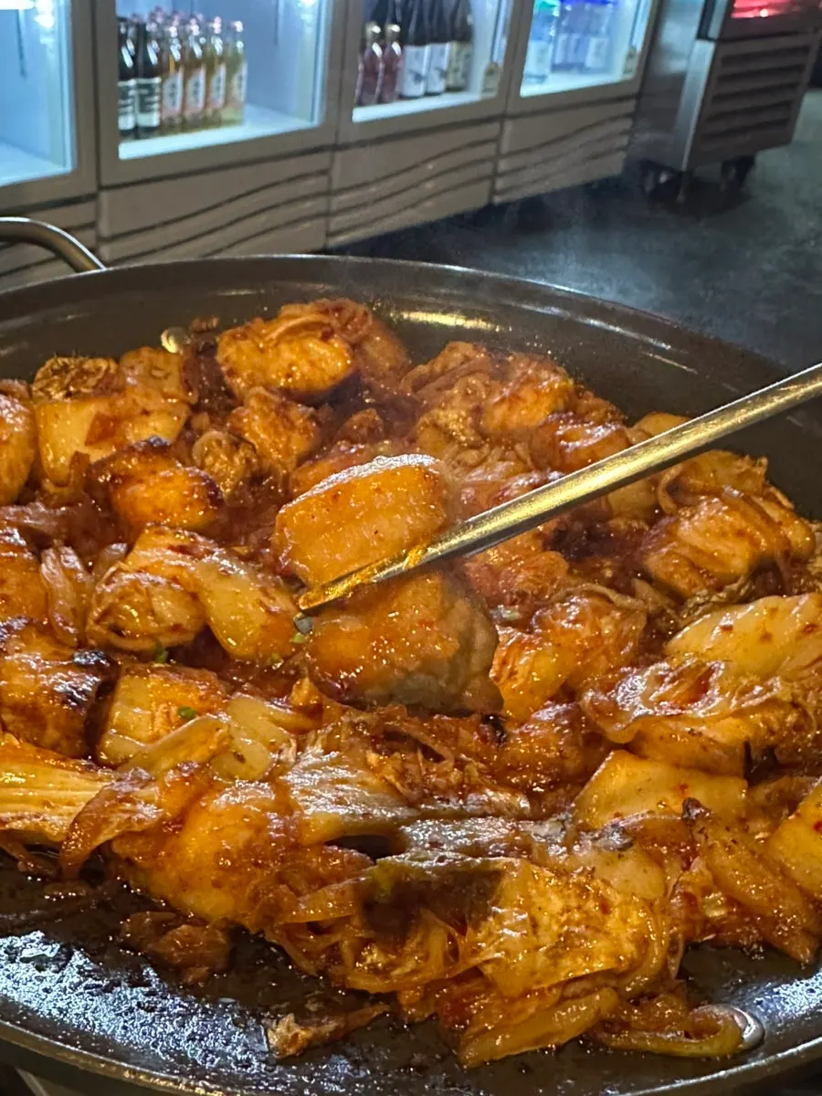 Kimchi grill kept warm over the burner