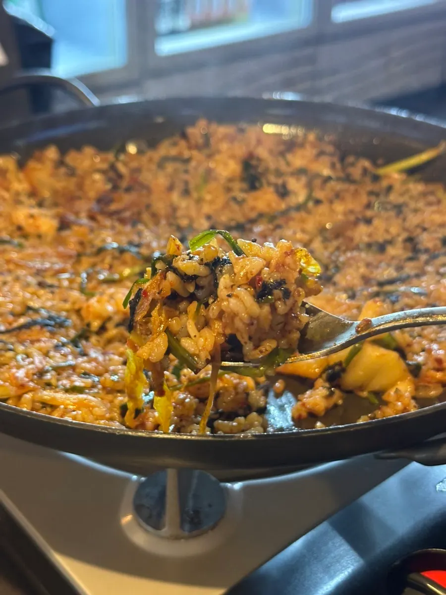 Fried rice with kimchi and seaweed flakes