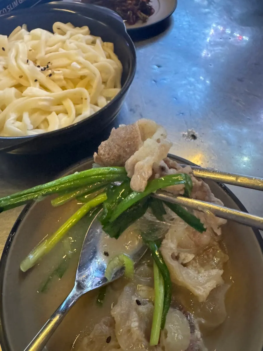A bite of chadolbagi beef wrapped in chives