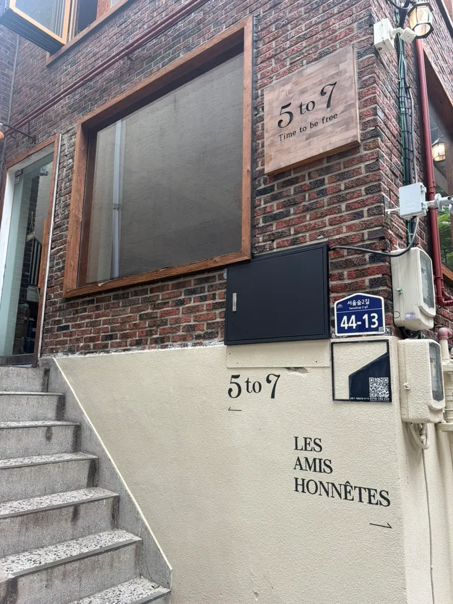 Red brick exterior of 5to7 in a Seongsu backstreet