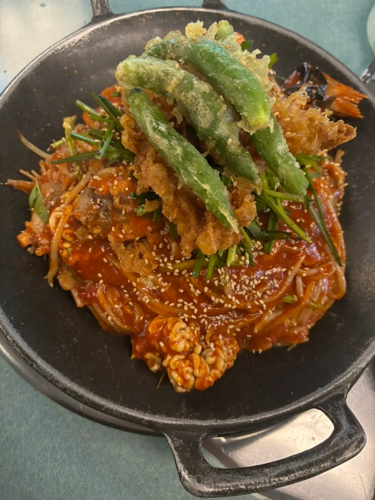 Korean beef fried tripe piled on agu-jjim