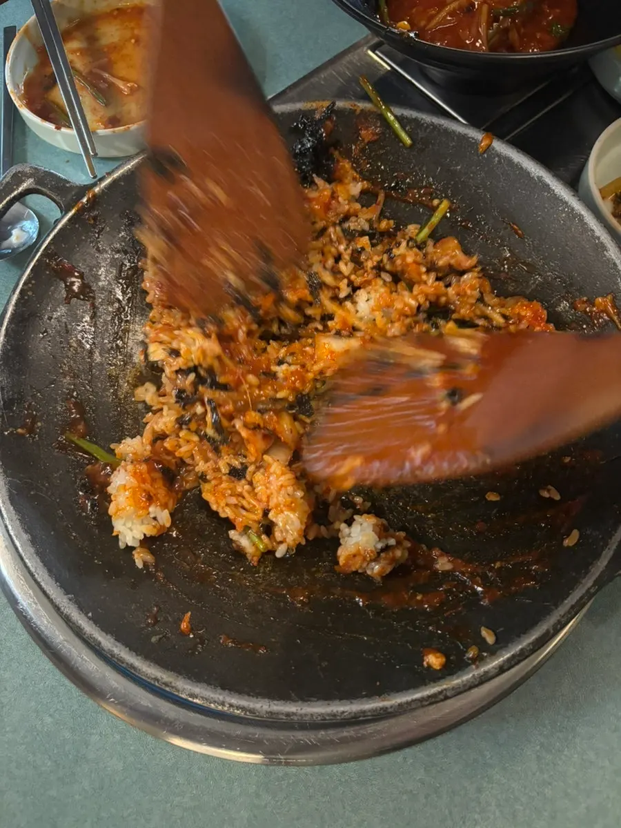Agu-jjim fried rice in a pan