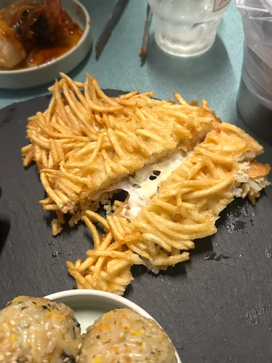 Thick cheese potato pancake with a crispy exterior