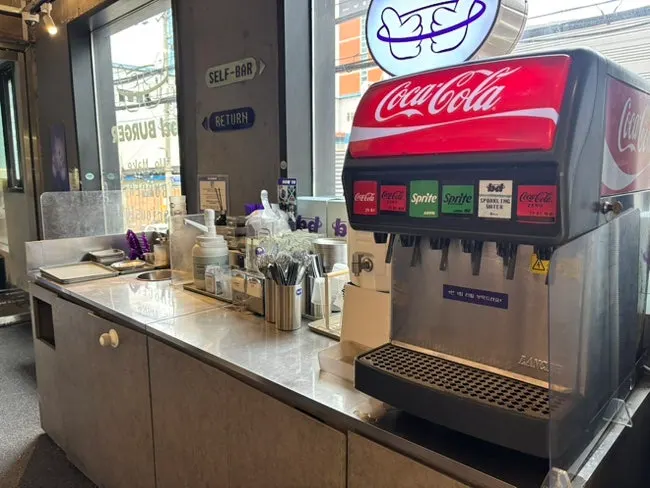 Self-serve bar for grabbing utensils and sauces