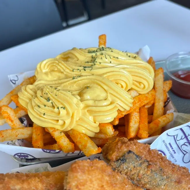 Fries topped with butter garlic sauce