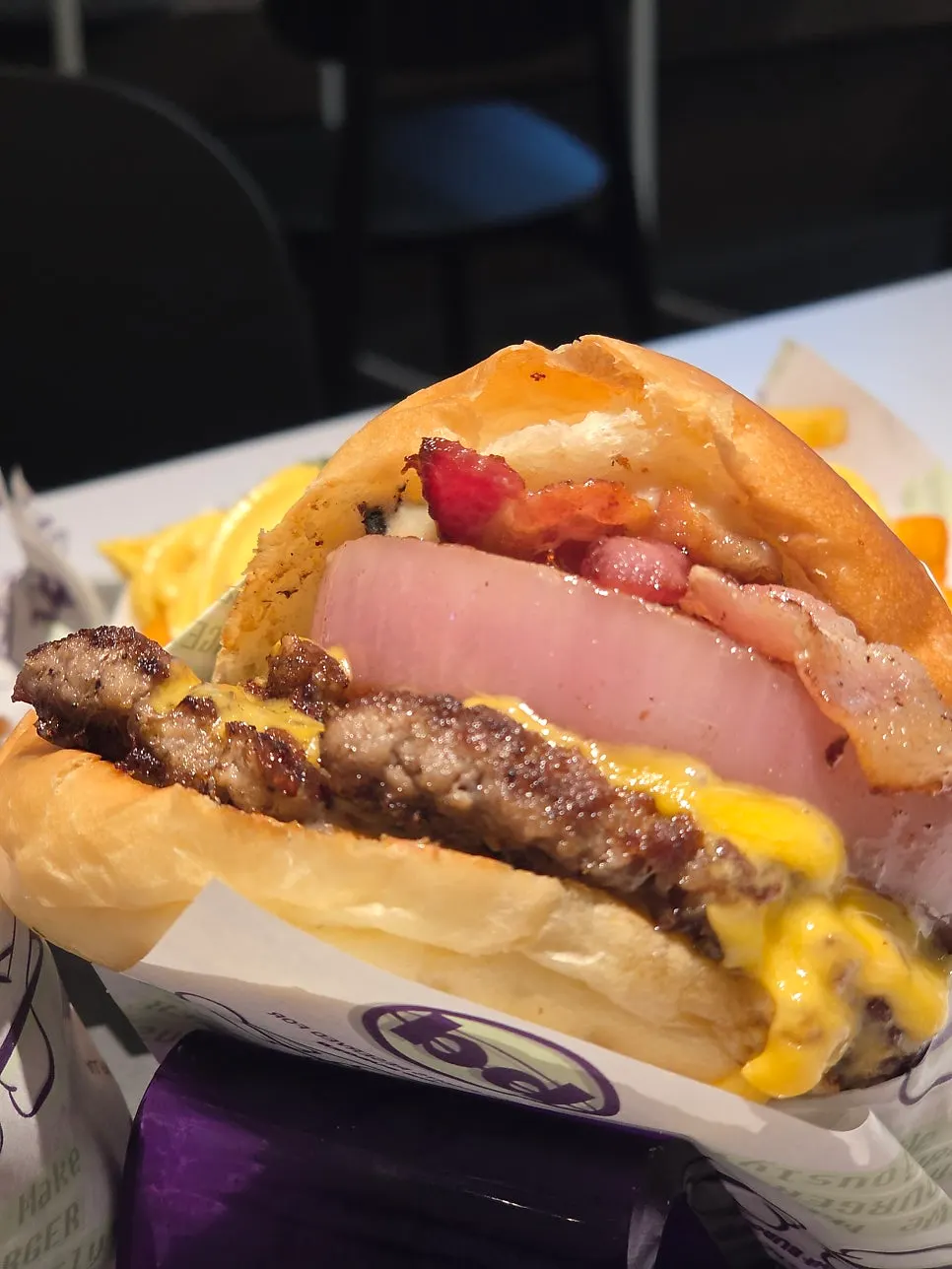 Cross-section of the double cheese burger showing the thick patty