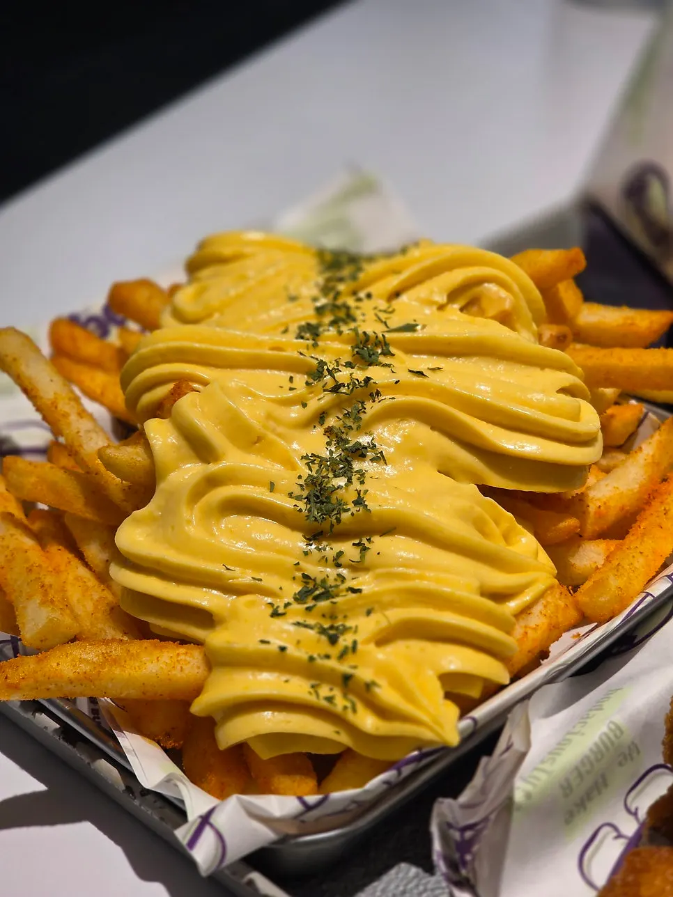 Butter garlic fries topped with butter sauce