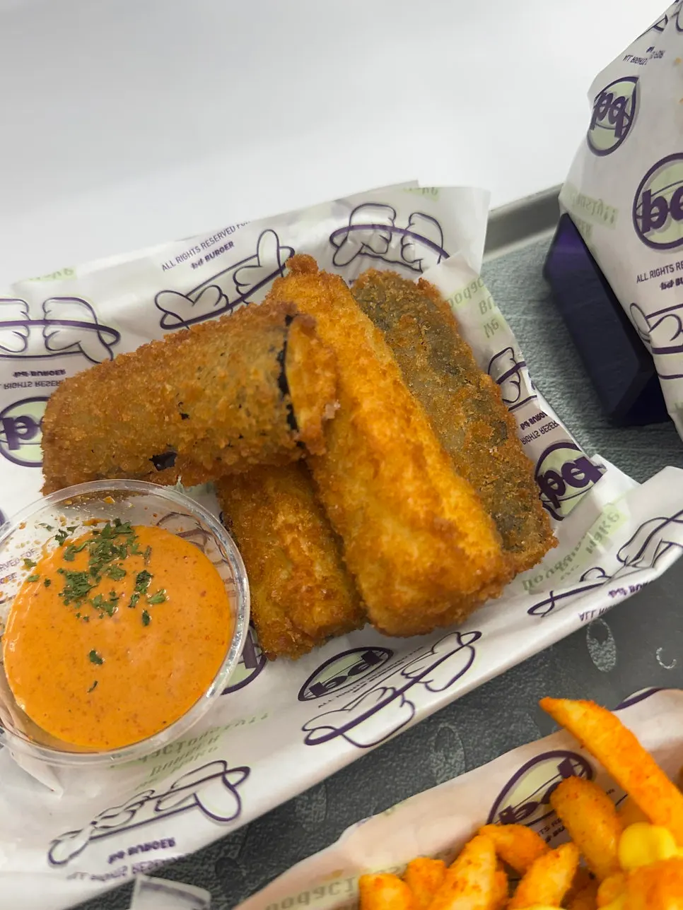 Eggplant fritters served with sriracha mayo sauce