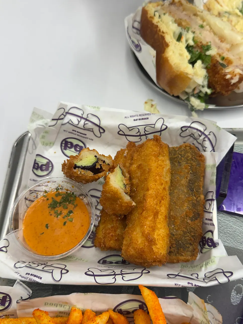 Cross-section of crispy-outside, moist-inside eggplant fritters