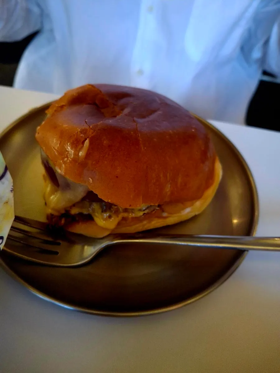 Cross-section of the double cheese burger showing the juices