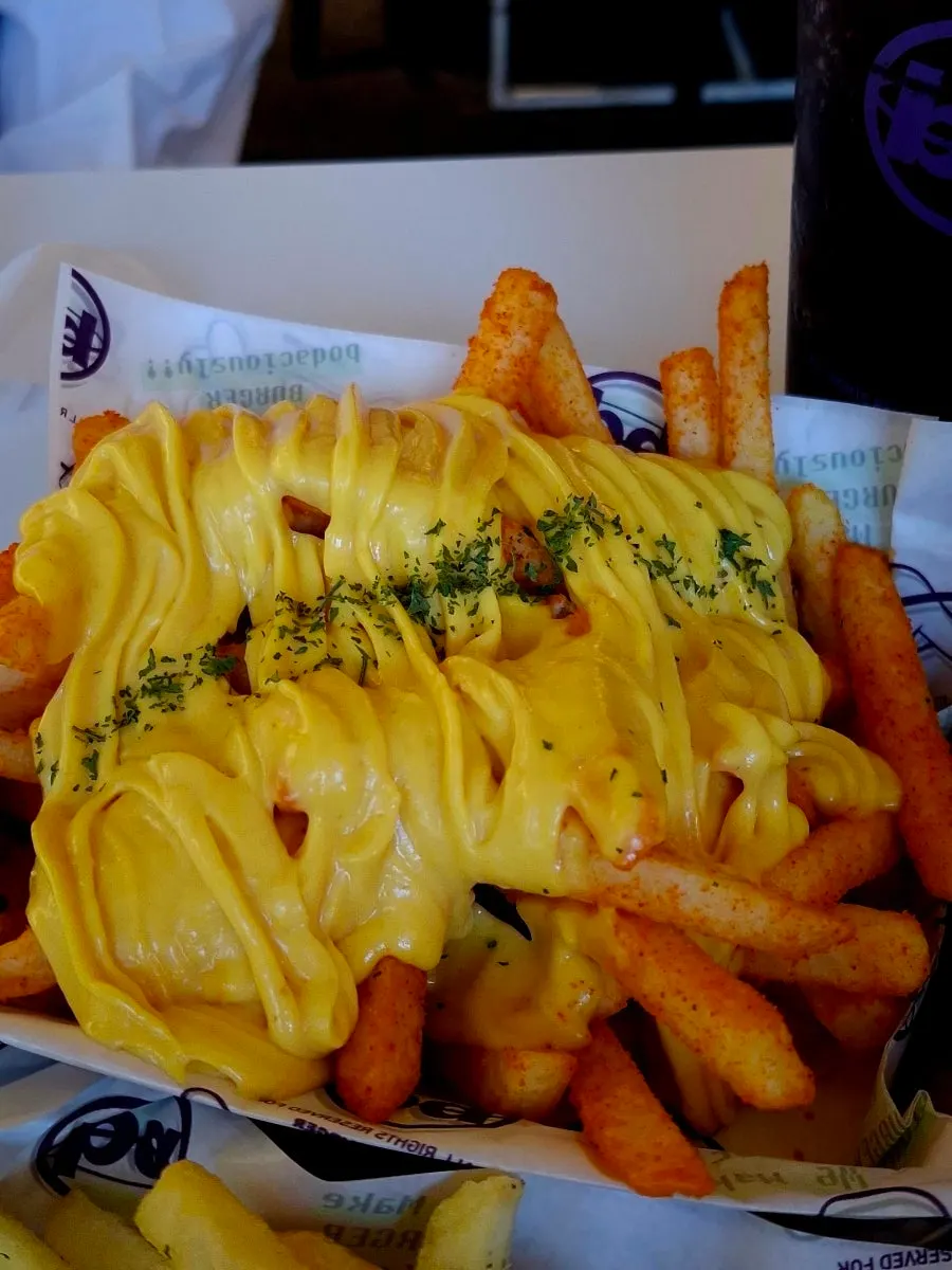Butter garlic fries topped with sauce