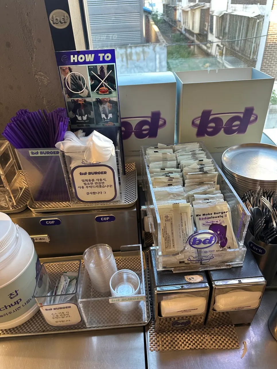 Self-service corner with napkins and ketchup