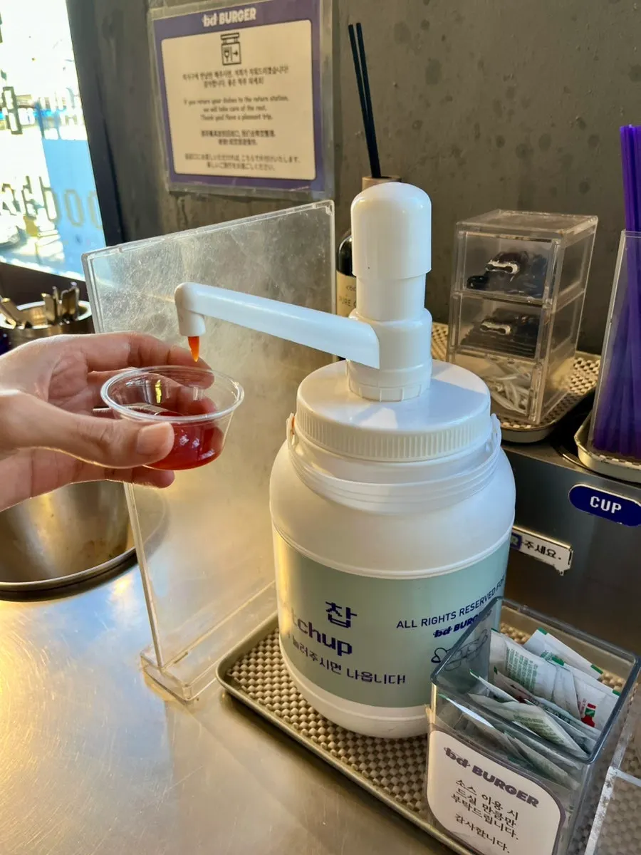Hot sauce and ketchup at the self-bar