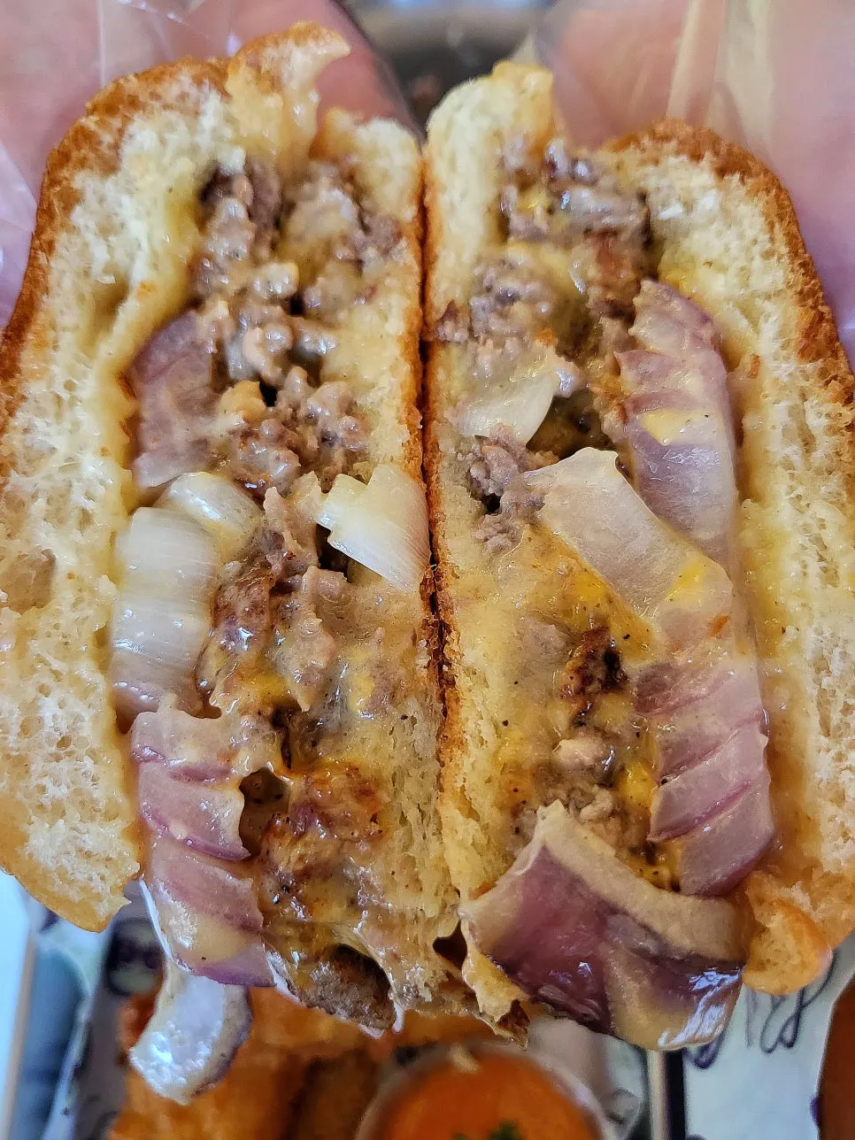 Double cheeseburger with cheese and grilled onion