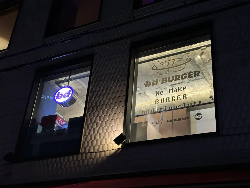 Sharing shrimp and double cheese burgers at bd Burger near Seongsu Station