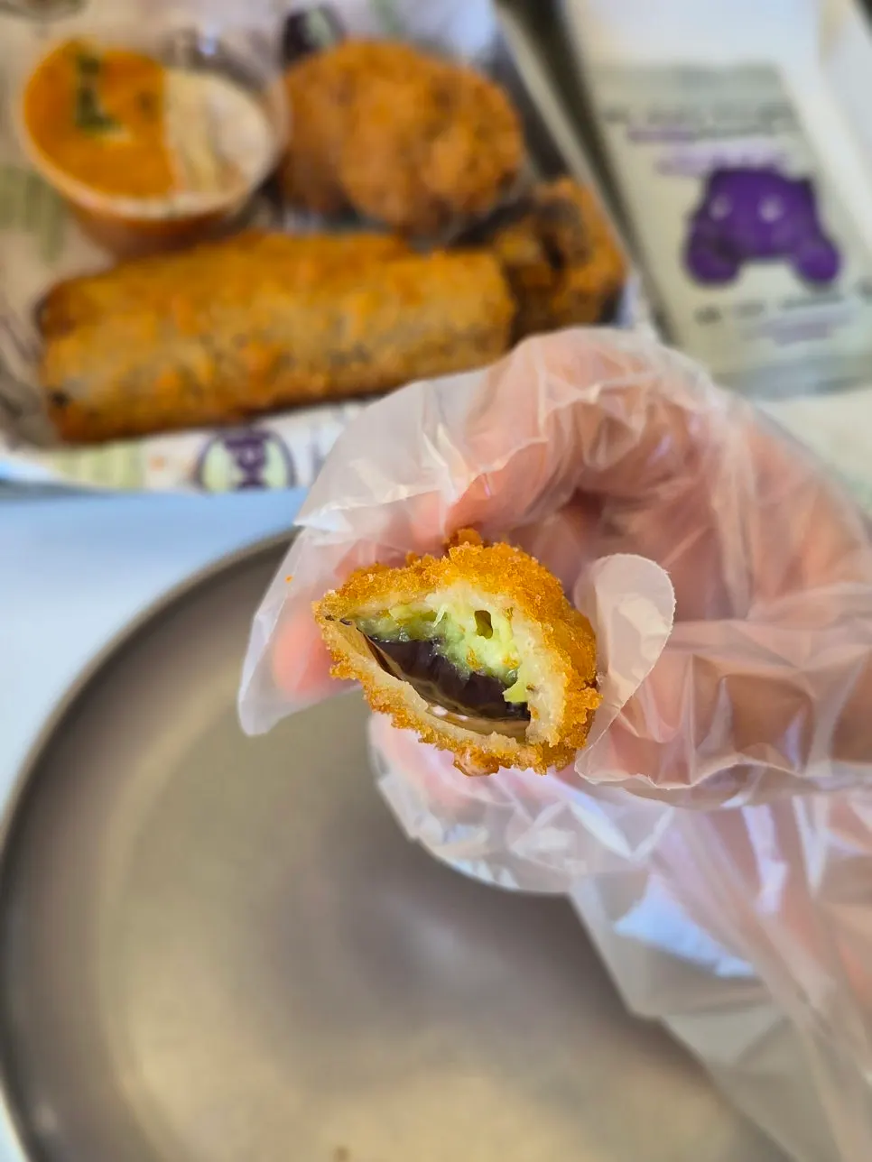 Fried eggplant served with a burger