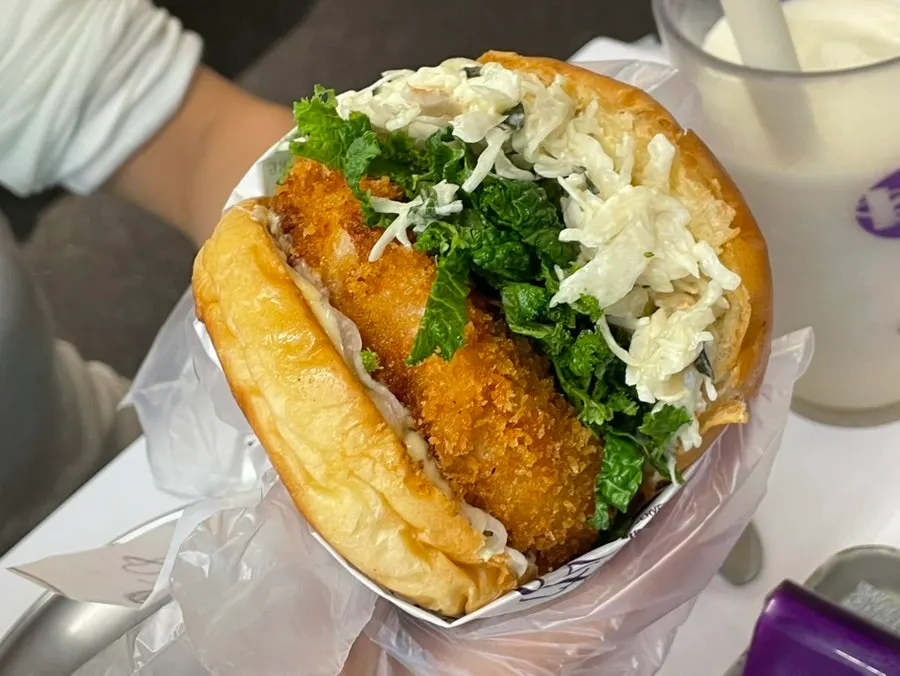 Inside of the shrimp burger showing the wasabi sauce