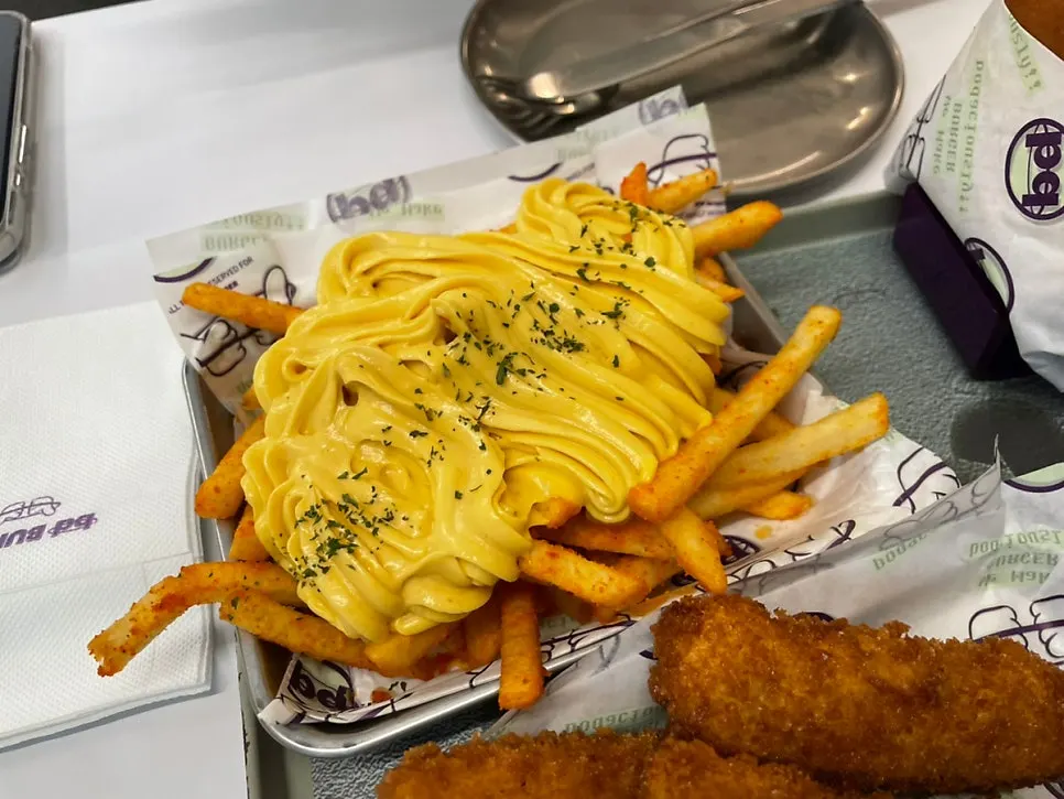 Seasoned fries with dipping sauce