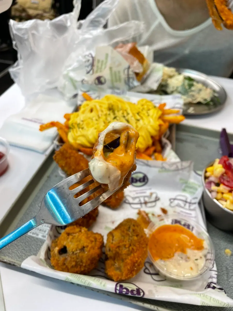 Eggplant fritters dipped in chipotle sauce