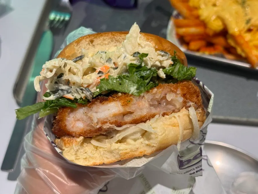 Cross-section of a bitten-into Wasabi Shrimp burger