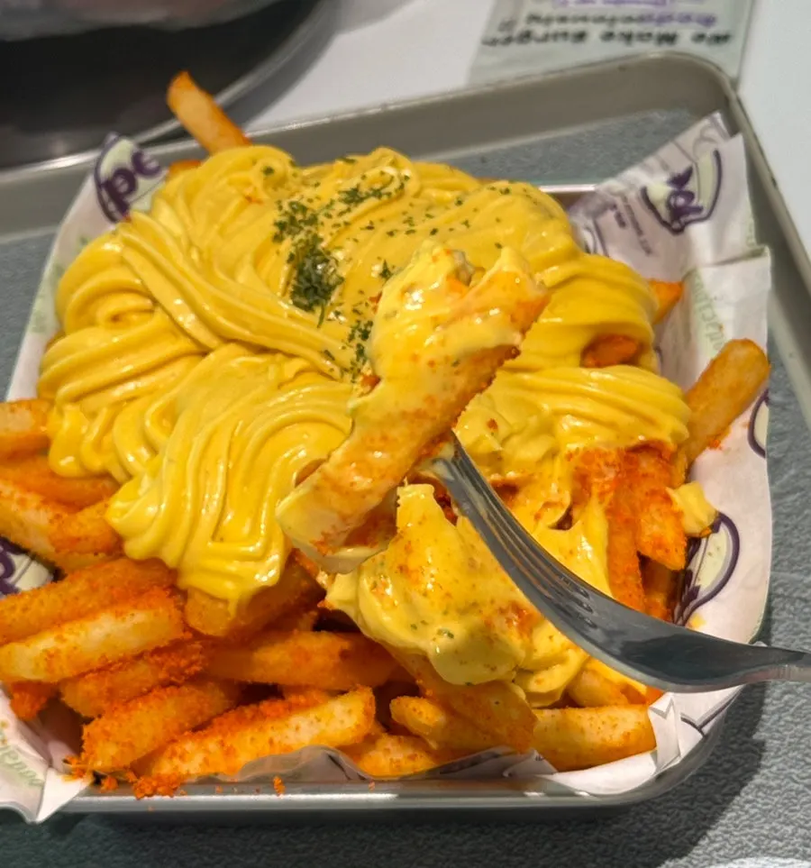 A generous portion of Butter Garlic Fries good for sharing between two